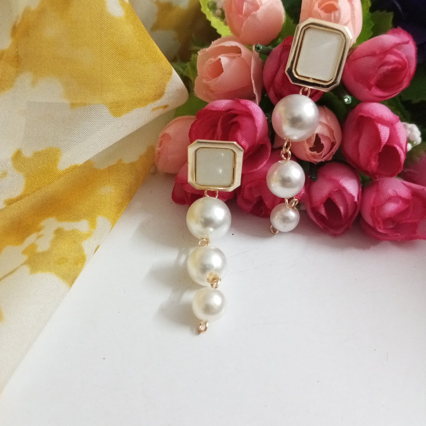 Gold Toned Drop Pearls Earrings