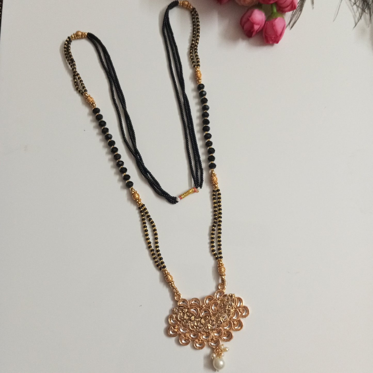 Cz studded Long Mangalsutra with Broad Pendant and a Hanging Pearl