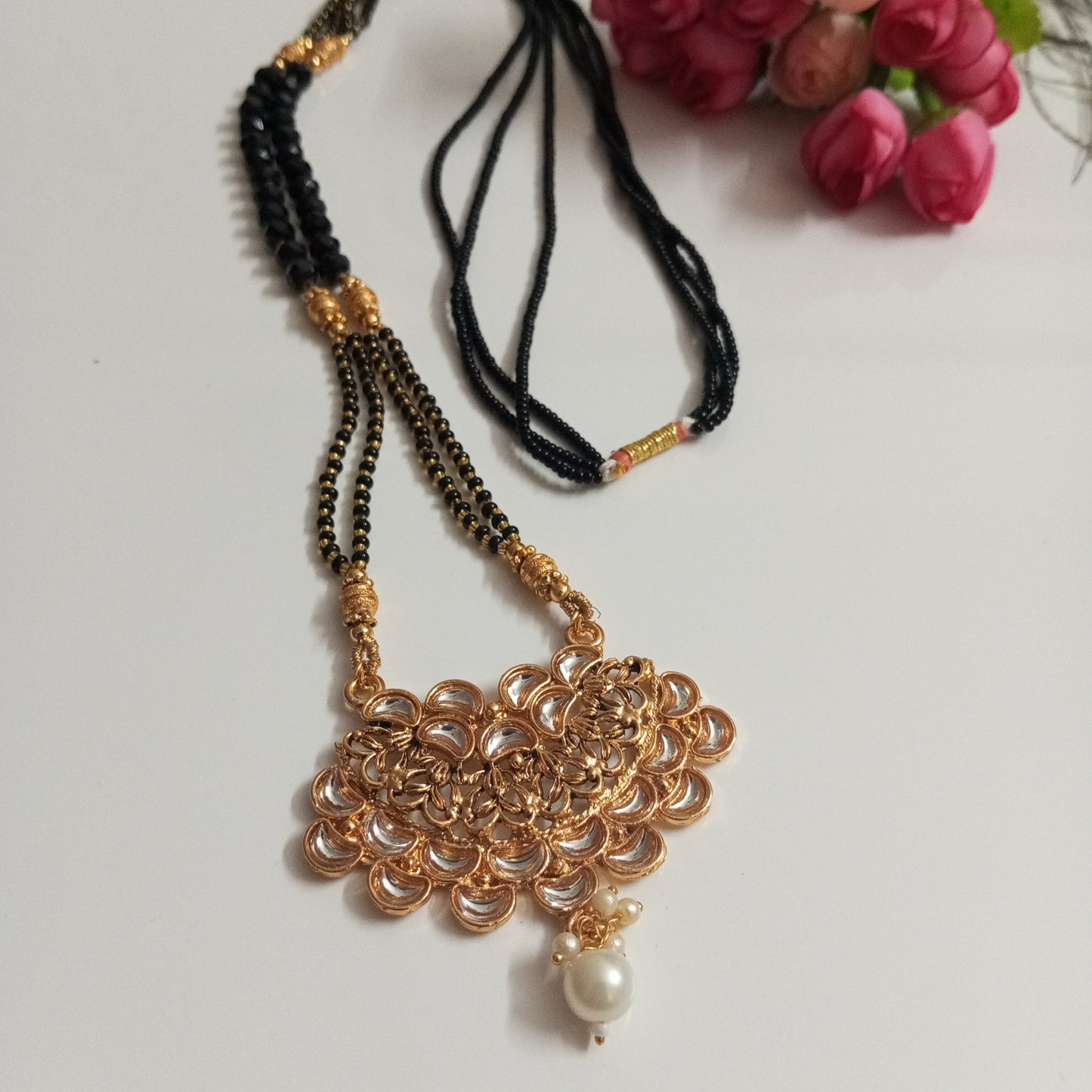 Cz studded Long Mangalsutra with Broad Pendant and a Hanging Pearl