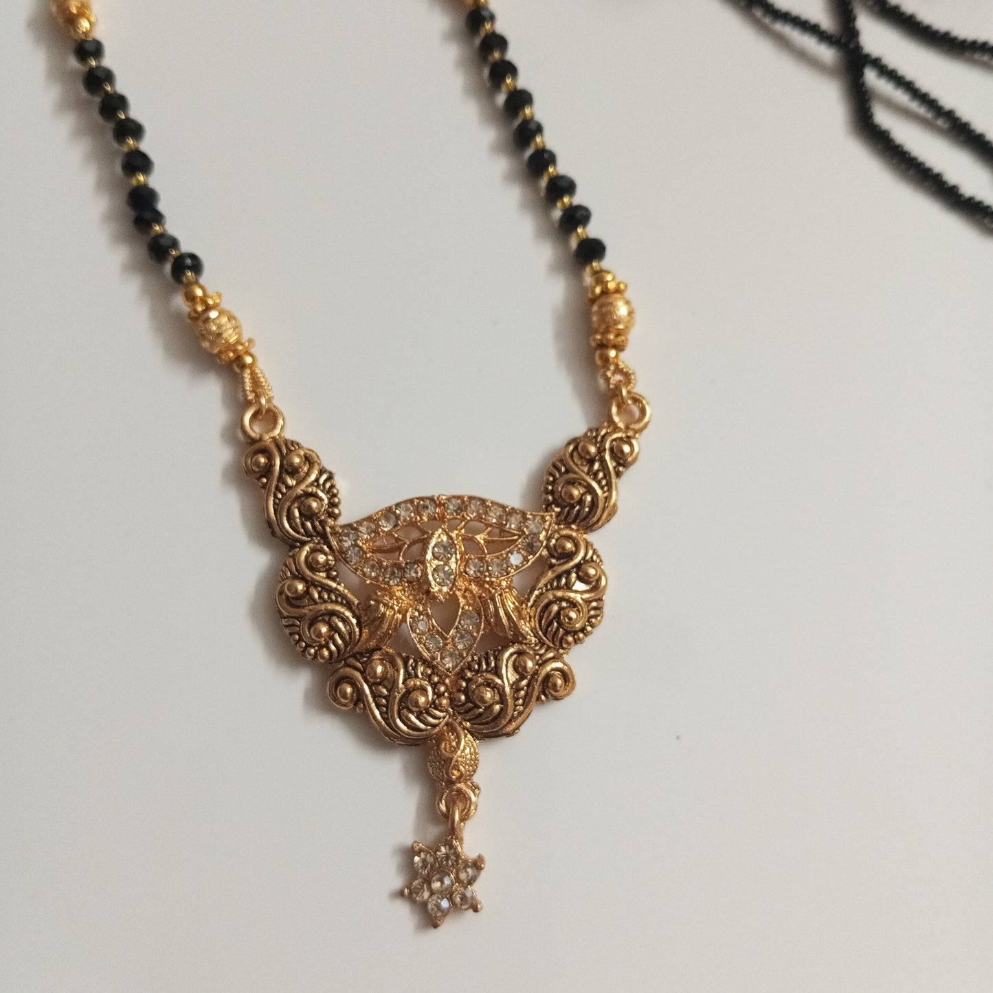 Cz Studded Long Mangalsutra with a Hanging Star