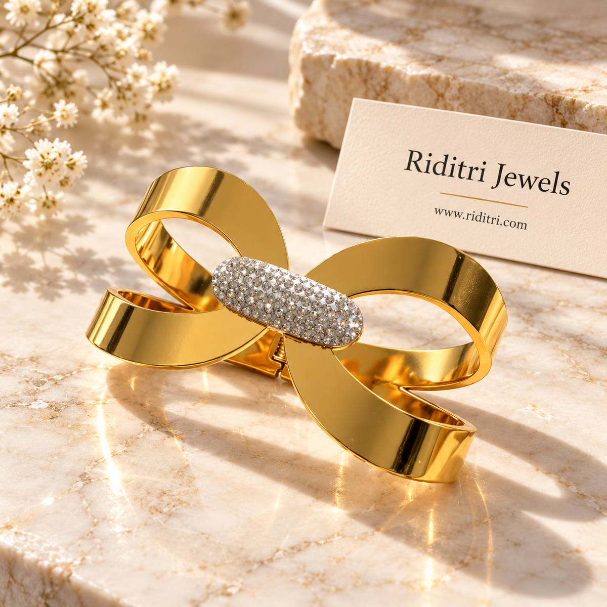 Detail of Aura Ribbon oval centre knot covered in CZ stones