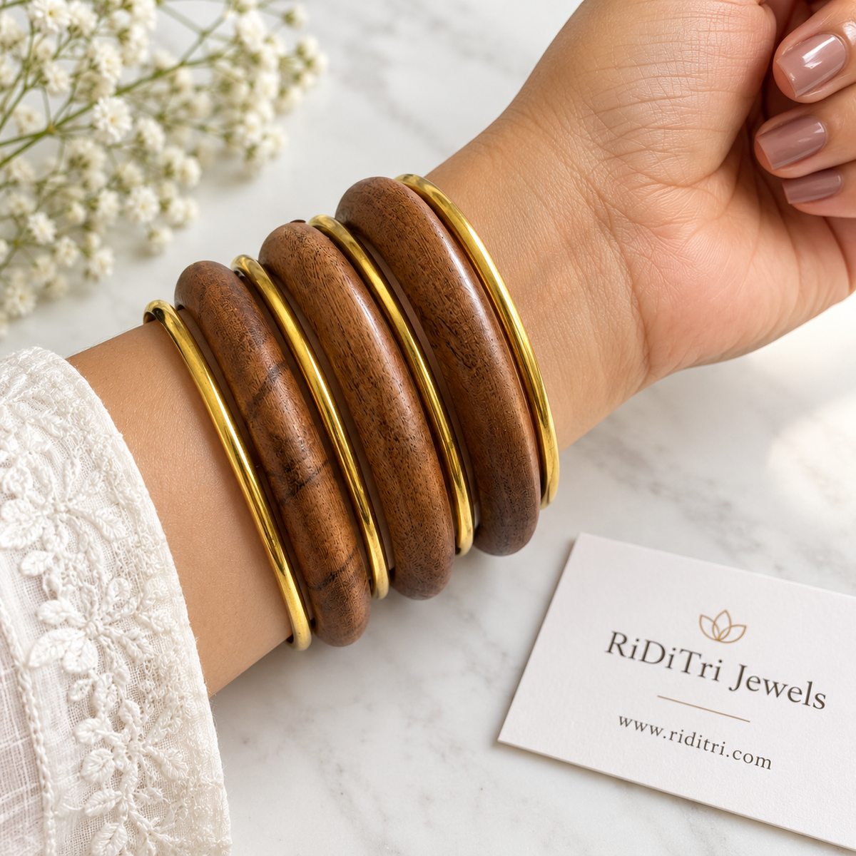 Vanshri bangle set of 5 with a studded wooden centre bangle, two smooth wooden bangles and two slim gold-toned bangles by Riditri