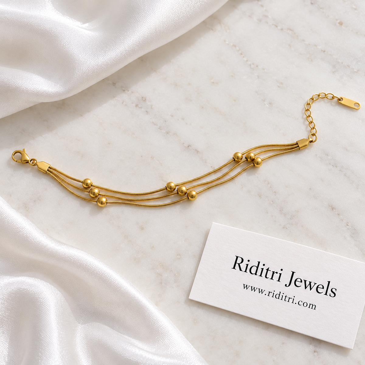 Anti Tarnish Triple Layer Bead Bracelet – full length with lobster clasp and adjustable extender chain, view 3