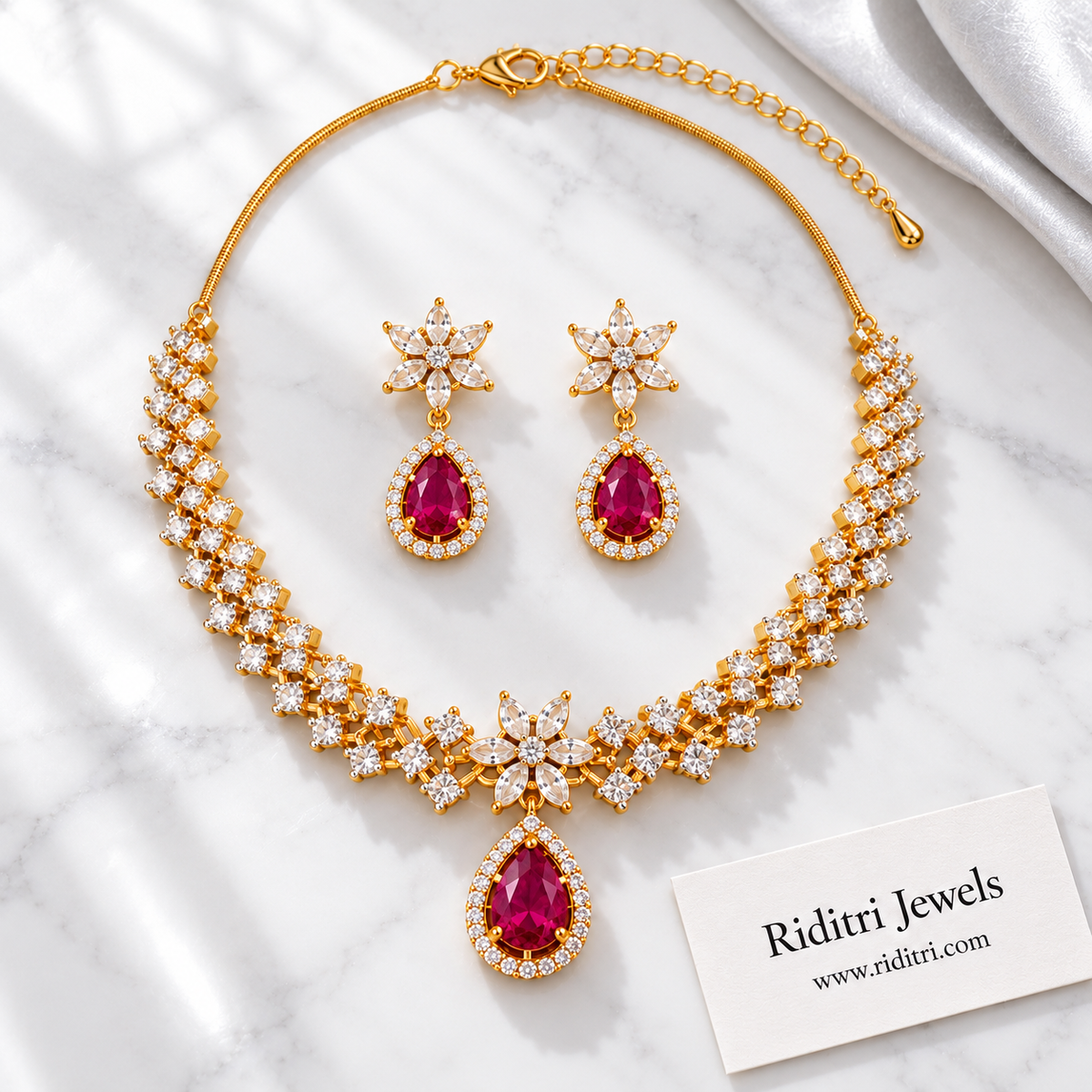 Close view of ruby teardrop pendant with halo of white stones