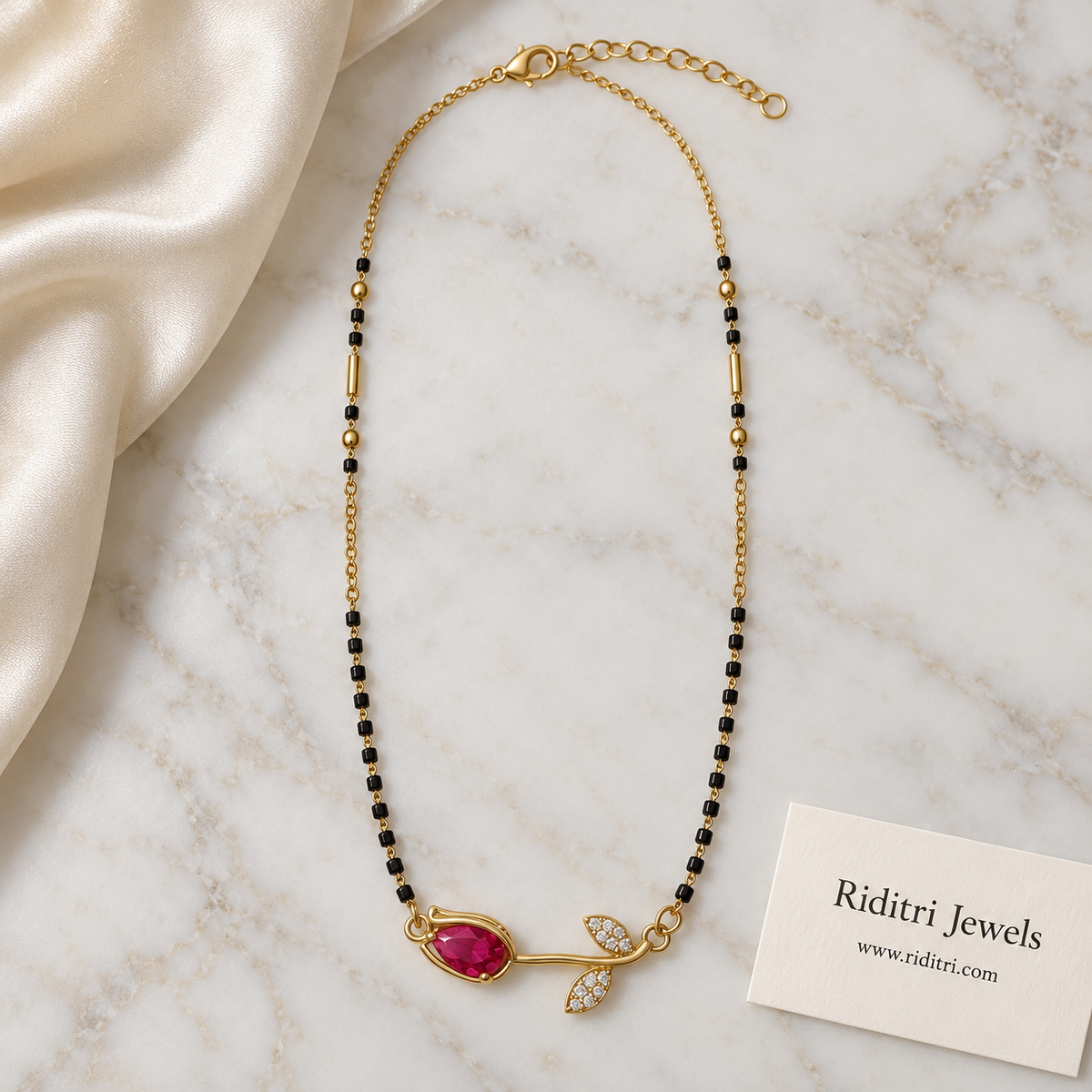 Black bead mangalsutra chain with gold beads and pink rose pendant