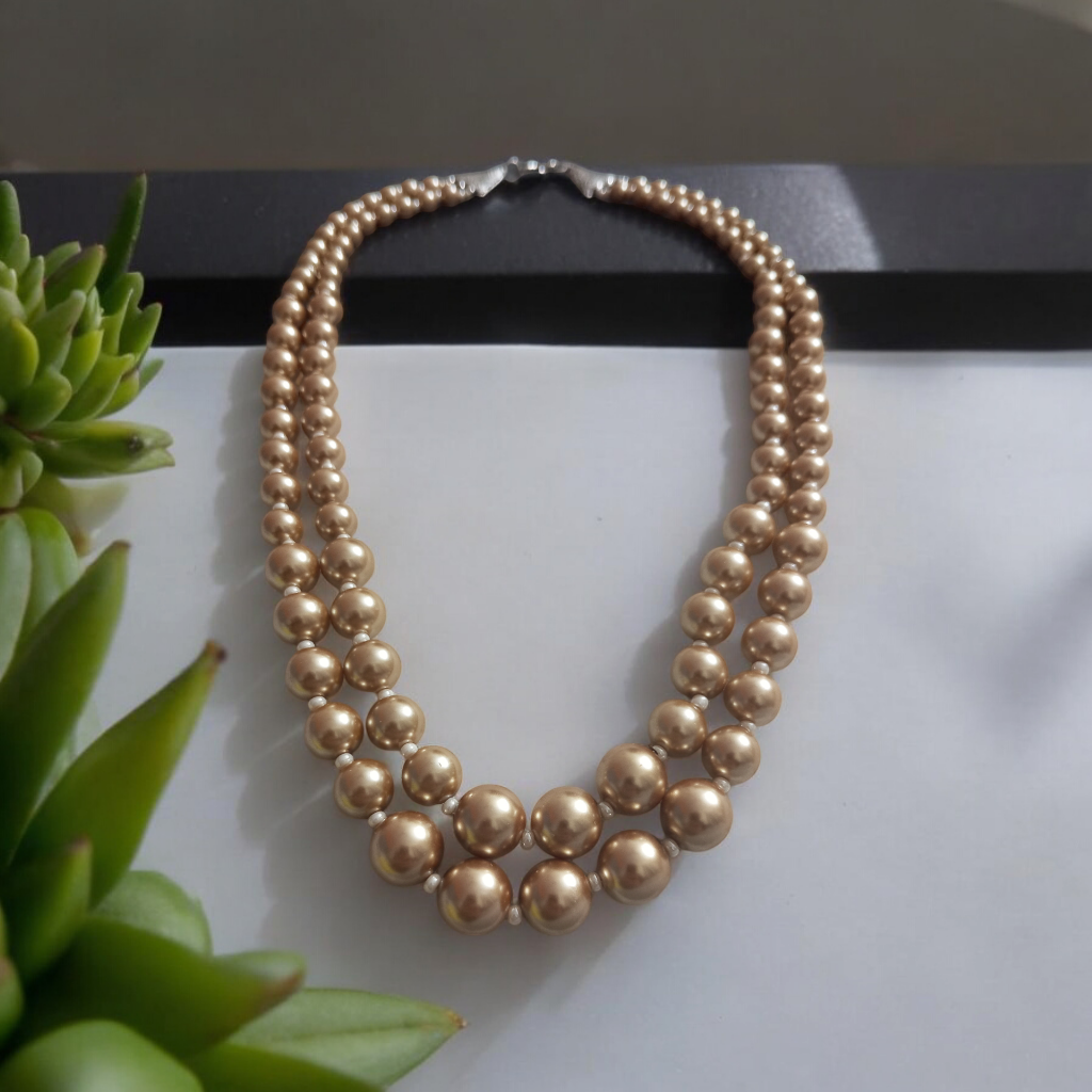 Golden Aanvi Shell Pearl Necklace