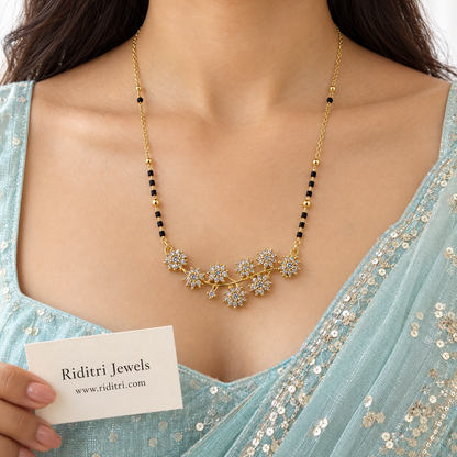 Gold-toned flower vine mangalsutra pendant with sparkling cluster stone flowers