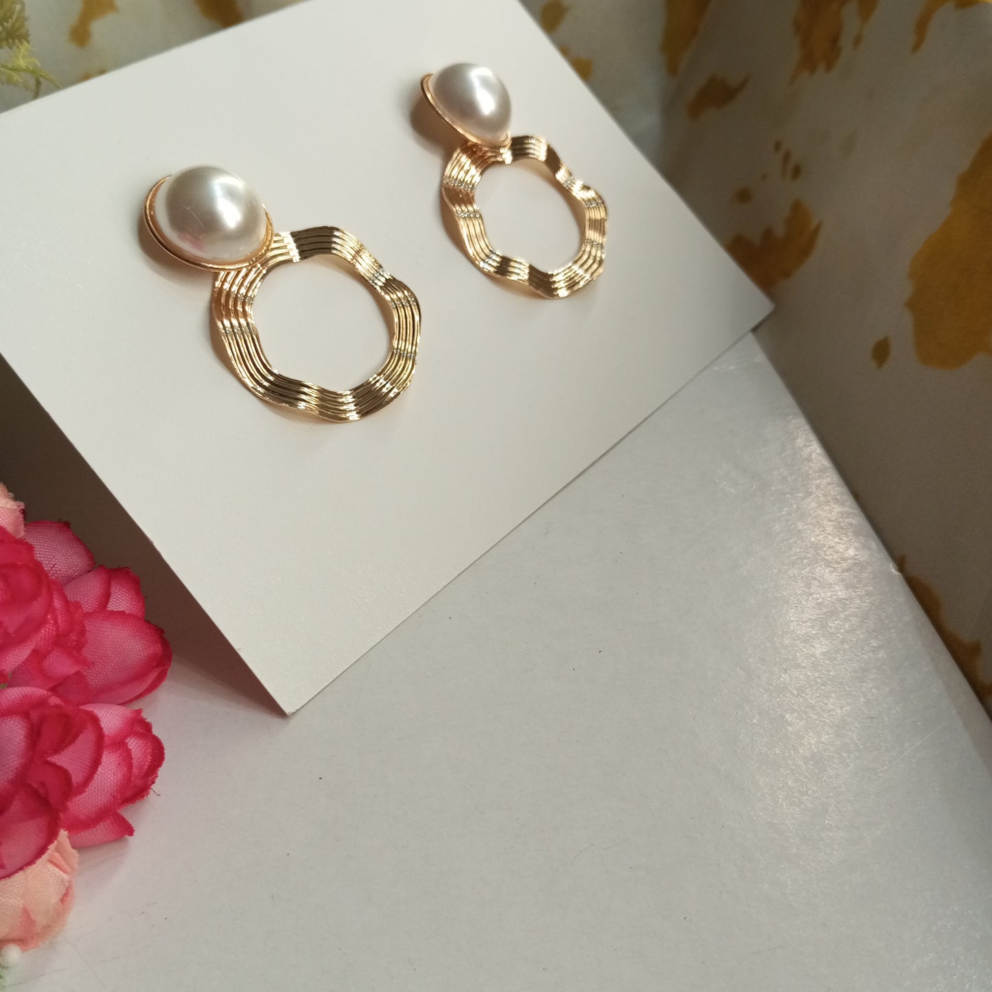 Spiral Contemporary Drop Earrings with Pearl Stud design