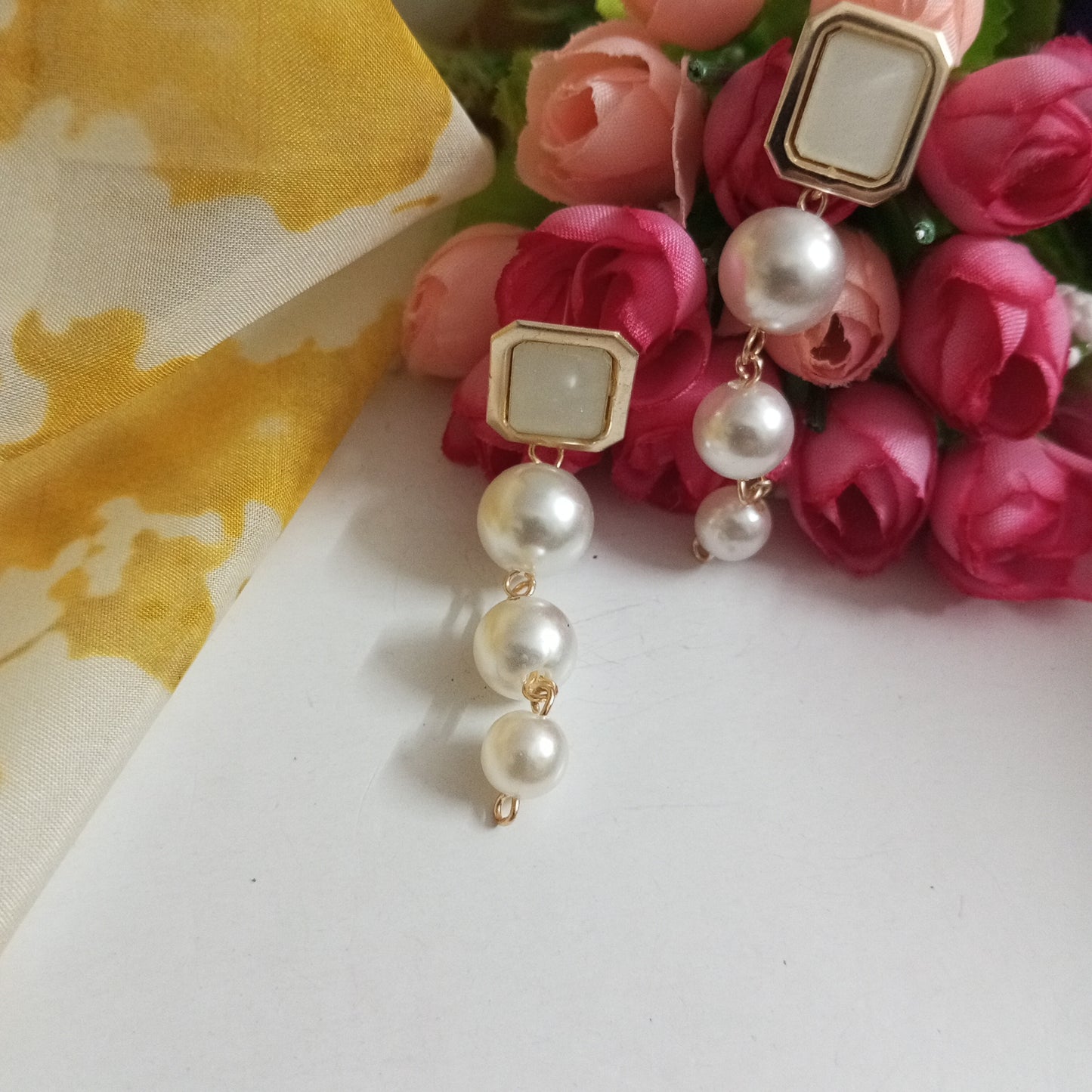 Gold Toned Drop Pearls Earrings