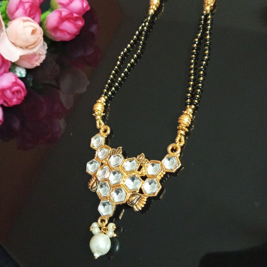 Cz studded Long Mangalsutra with a Hanging Pearl