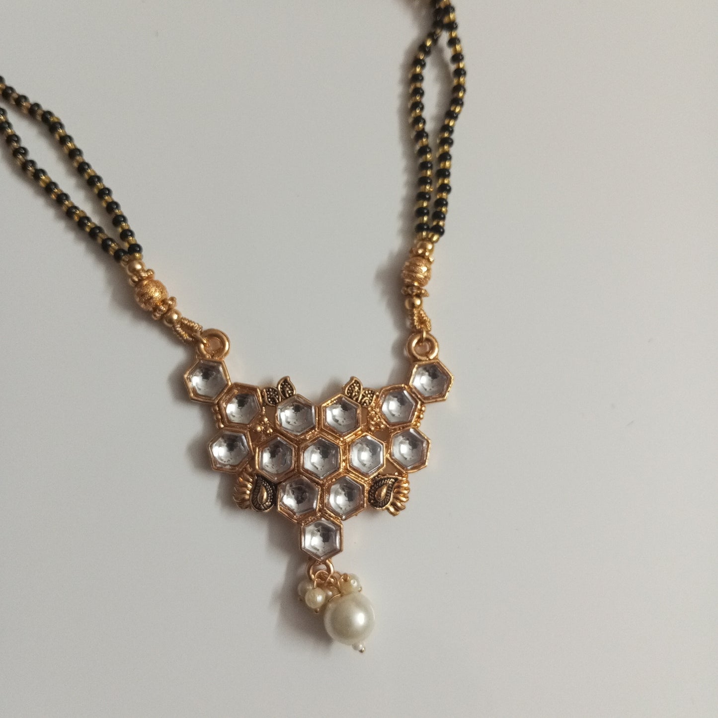 Cz studded Long Mangalsutra with a Hanging Pearl