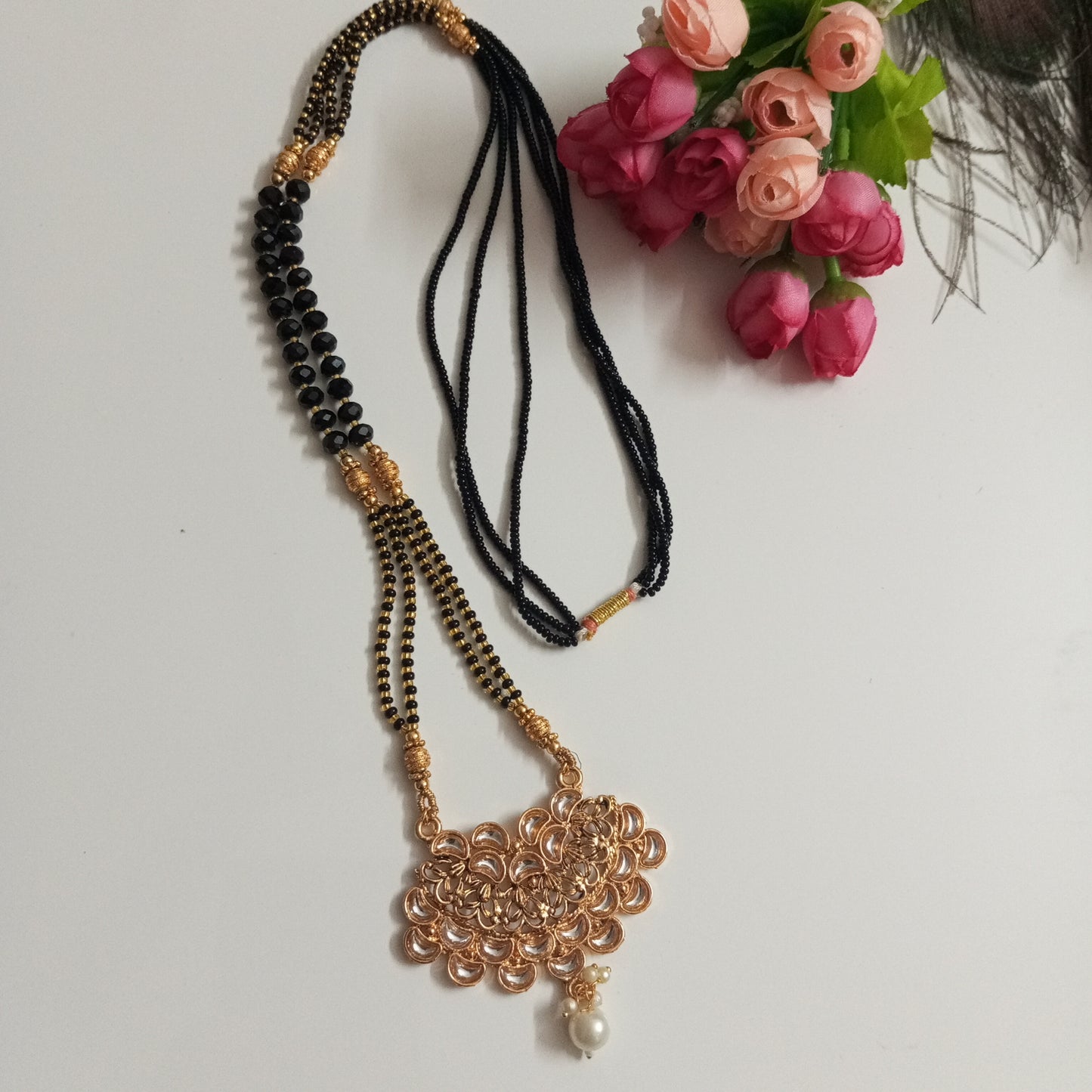 Cz studded Long Mangalsutra with Broad Pendant and a Hanging Pearl