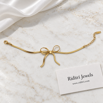 Anti Tarnish Gold Bow Bracelet – full length with lobster clasp and adjustable extender chain, view 3