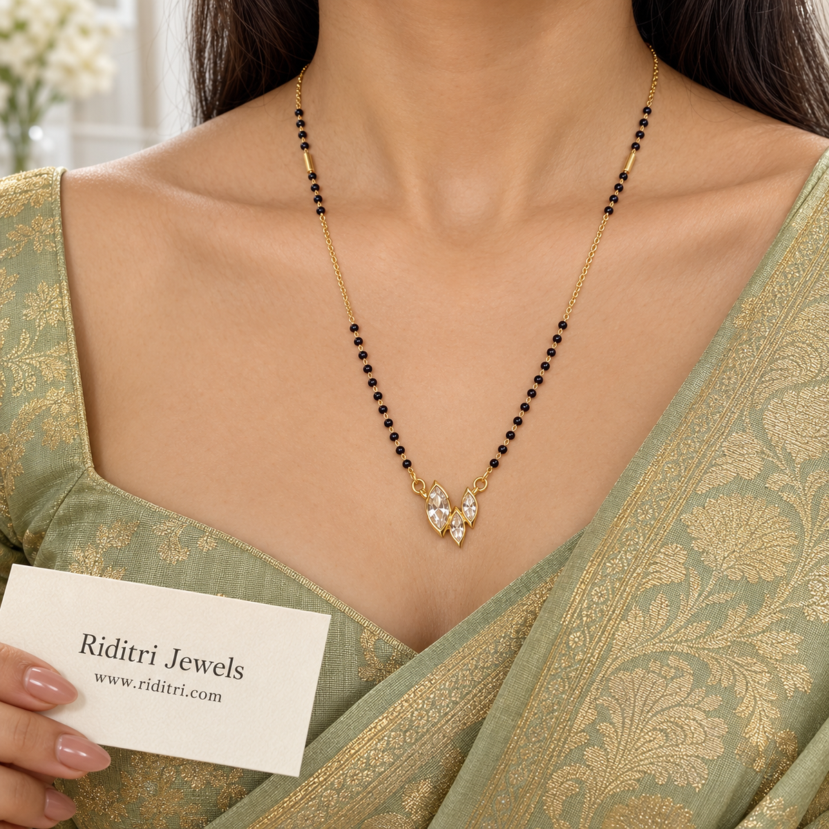 Gold-toned marquise trio mangalsutra pendant with bezel-set clear stones