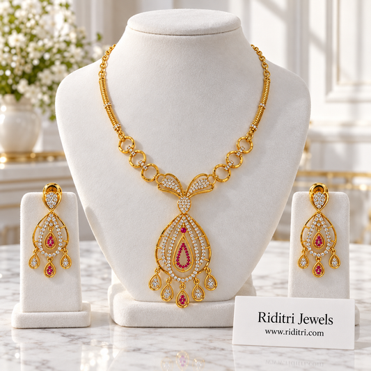 Roshni gold plated pendant necklace set with matching earrings