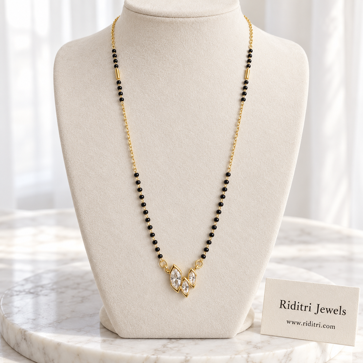 Titli anti-tarnish mangalsutra with three marquise AD stones in a butterfly-wing cluster