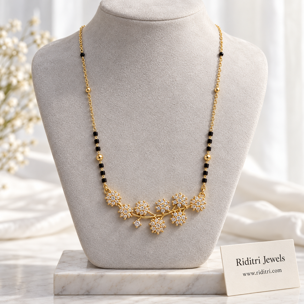 Bahaar anti-tarnish flower vine mangalsutra with AD stone flowers on a gold branch