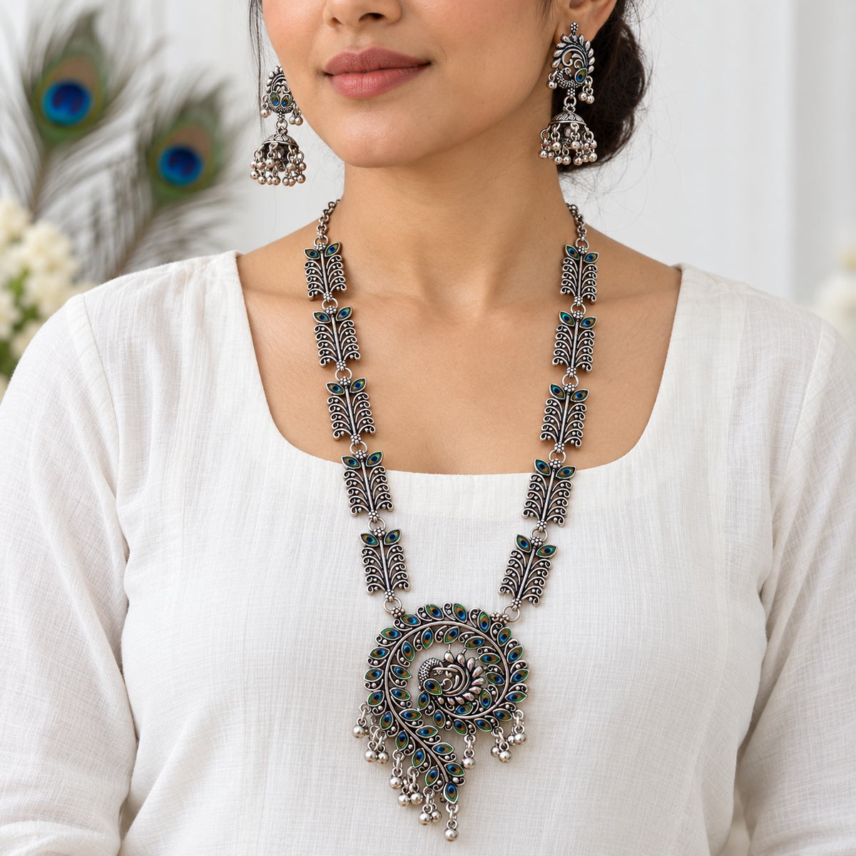 Morpankh Oxidised Necklace Set – close-up of round peacock pendant with blue-green morpankh enamel and ghungroo drops, view 2