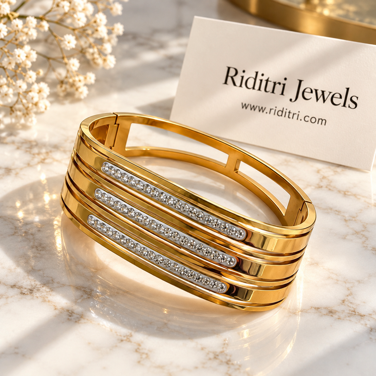 Aura Linea gold-toned anti-tarnish cuff bracelet with three lines of CZ stones