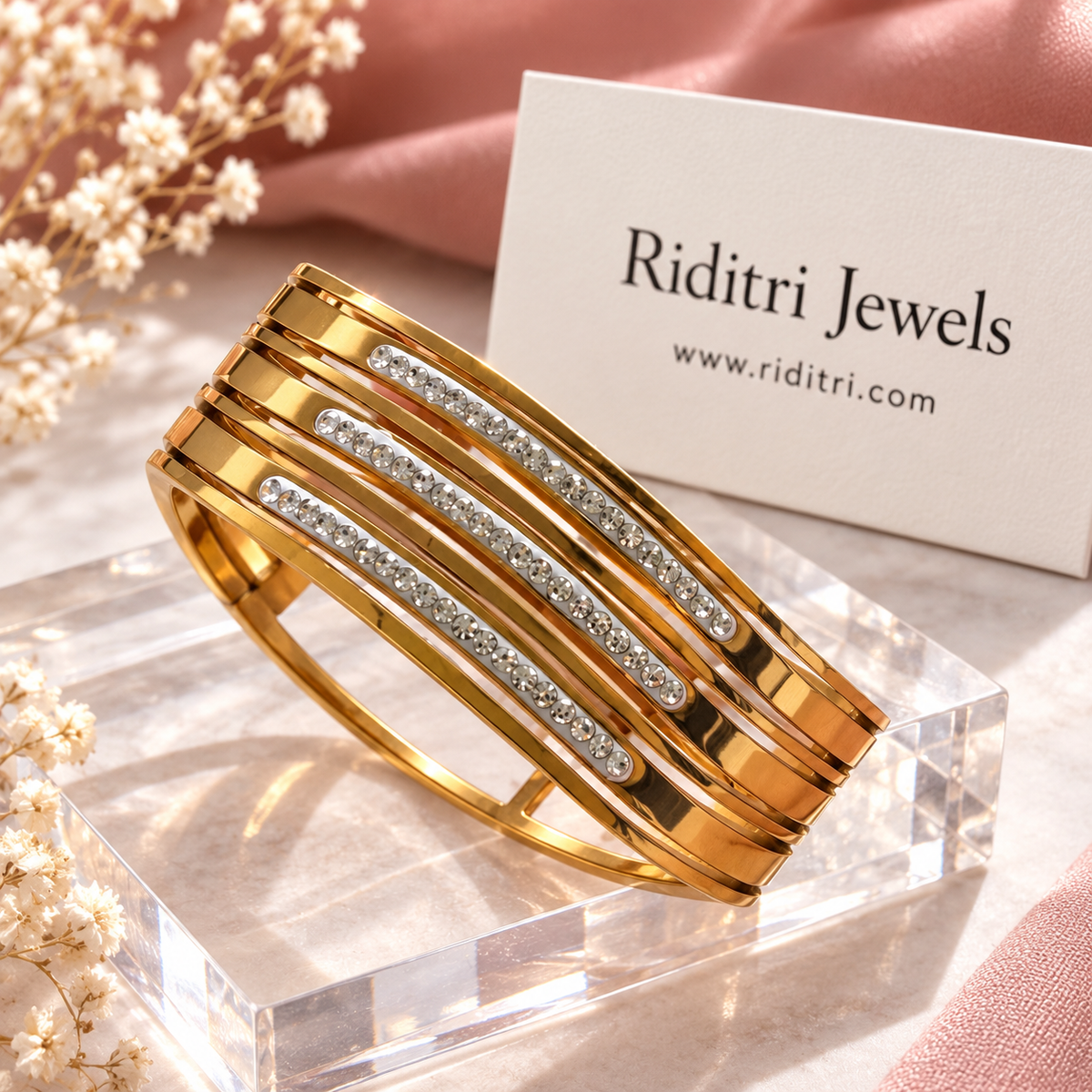 Detail of Aura Linea straight CZ stone lines on gold-toned bands