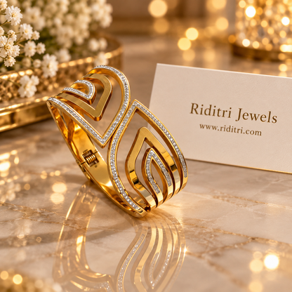 Broad Aura Echo openable bracelet with layered curved gold-toned bands