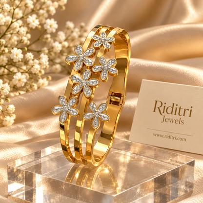 Aura Blossom floral openable bracelet with silver-toned petals on gold bands