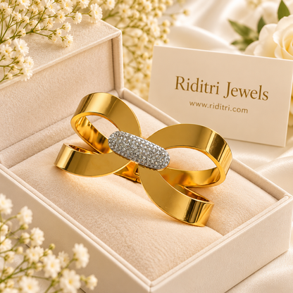 Aura Ribbon gold-toned anti-tarnish bow bracelet with CZ centre knot