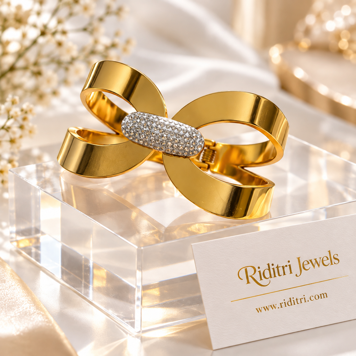 Aura Ribbon CZ bow bracelet in waterproof stainless steel by Riditri Jewels