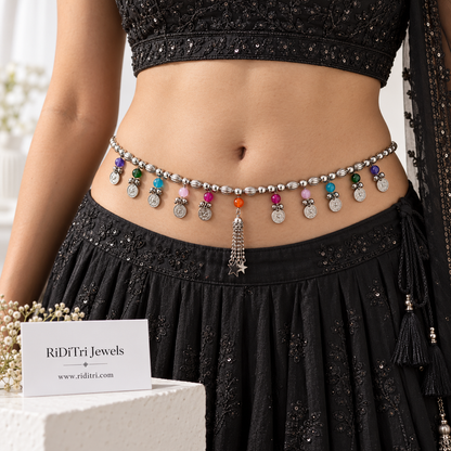 Multicolour stone silver-toned waist belt (kamarbandh) by Riditri with coin charms and ghungroo bells