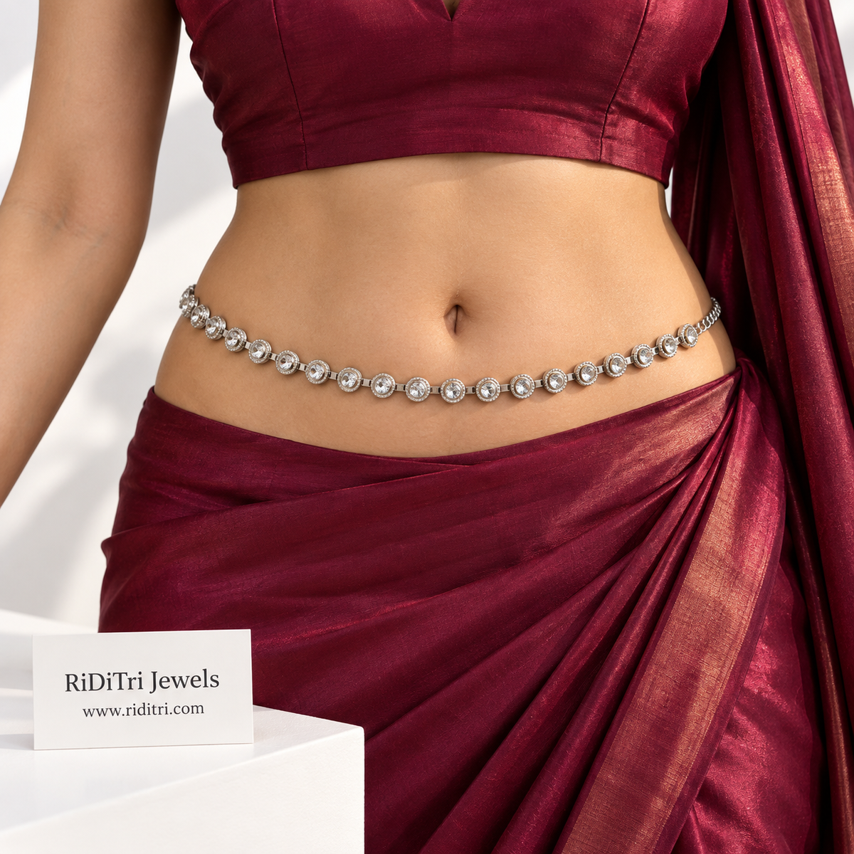 Crystal stone silver-toned waist belt (kamarbandh) by Riditri with a single line of clear stones