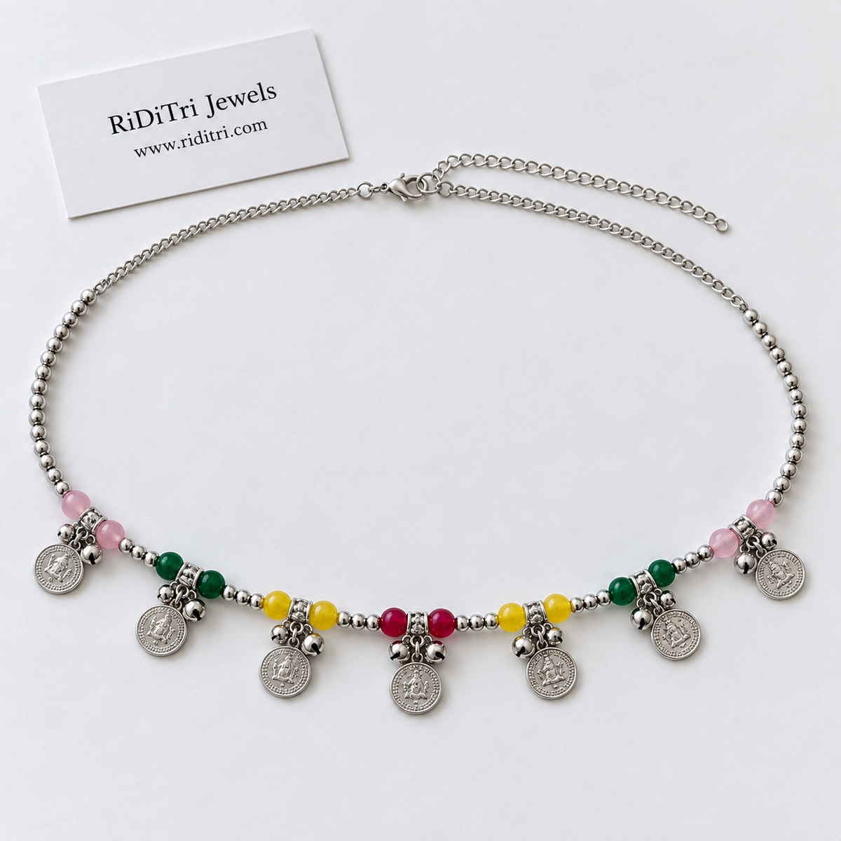 Silver-toned waist chain with coin charms, tiny ghungroo bells and pink, green, yellow and ruby stones, view 2