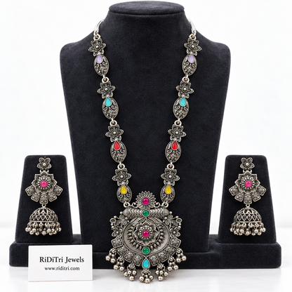 Satrangi oxidised long necklace set with seven-colour stones, ghungroo pendant and matching jhumka earrings by Riditri