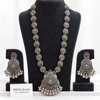Jaali oxidised long necklace set with lattice-engraved links, multicolour stones, ghungroo fringe pendant and matching earrings by Riditri