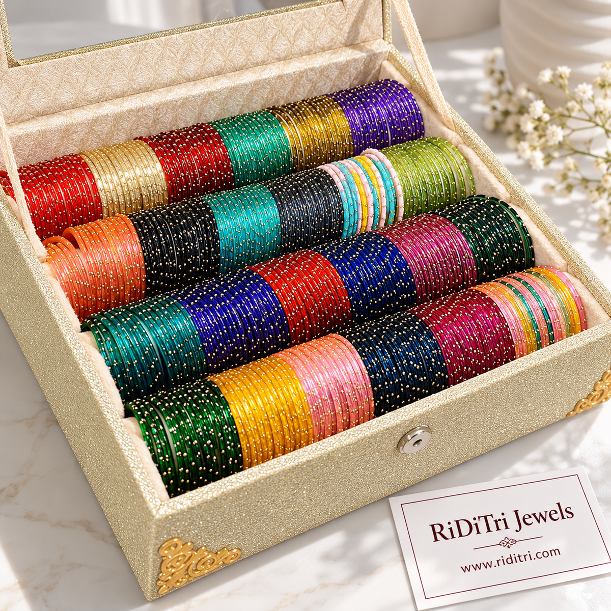 Raindrop glass bangles box with 24 dozen multicolour glass bangles in 24 colours and a 4-roll bangle storage box by Riditri