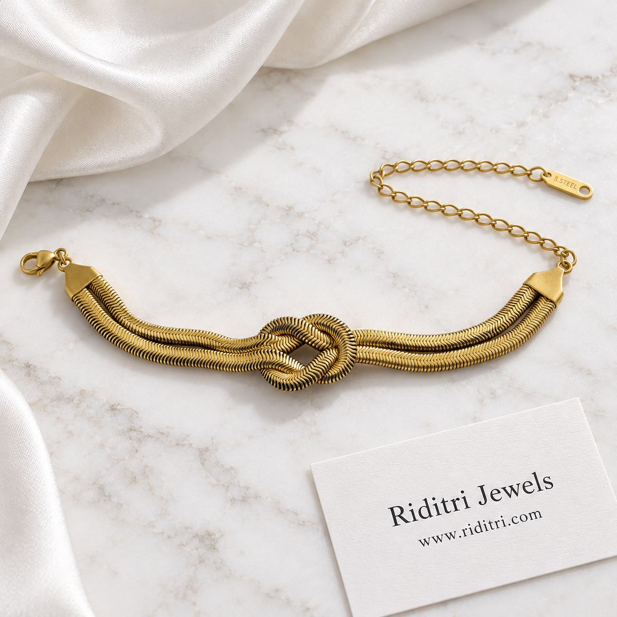 Anti Tarnish Love Knot Bracelet – full length with flat herringbone chains and adjustable extender chain, view 3
