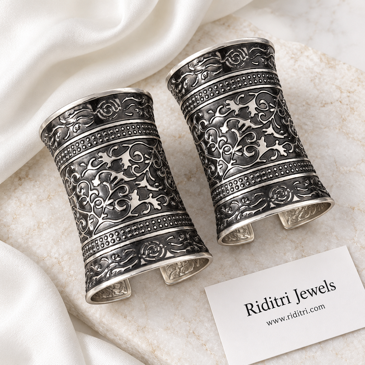 Bel Buta Adjustable Broad Cuff Bracelets – inside view of the silver-toned open cuffs showing the adjustable opening, view 2