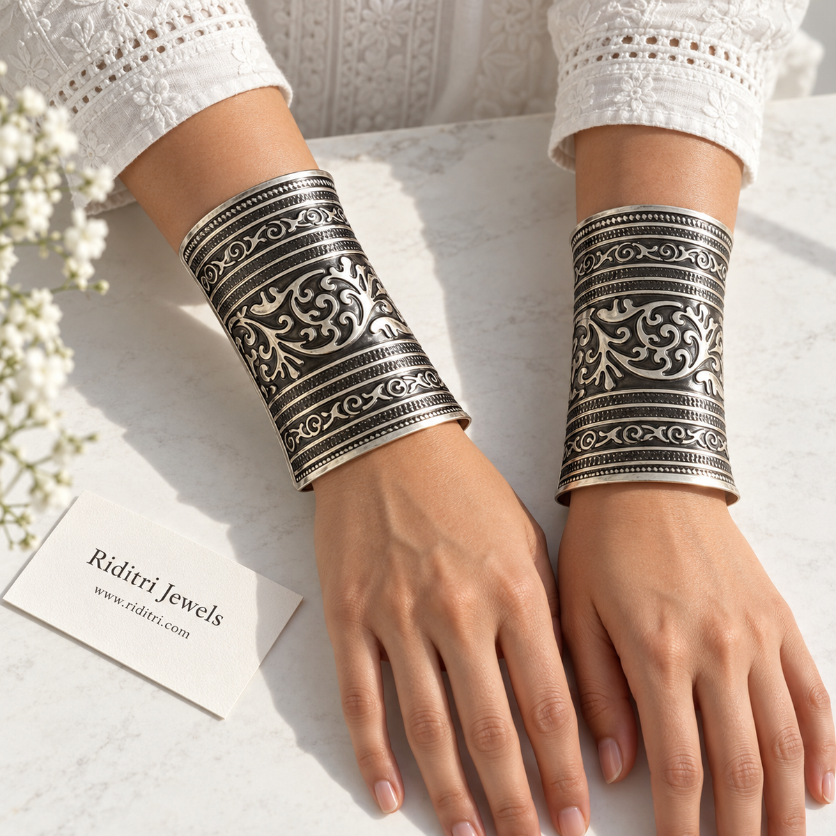 Shahi scroll adjustable broad cuff bracelets pair with royal scroll motif and textured bands in oxidised silver-toned finish by Riditri