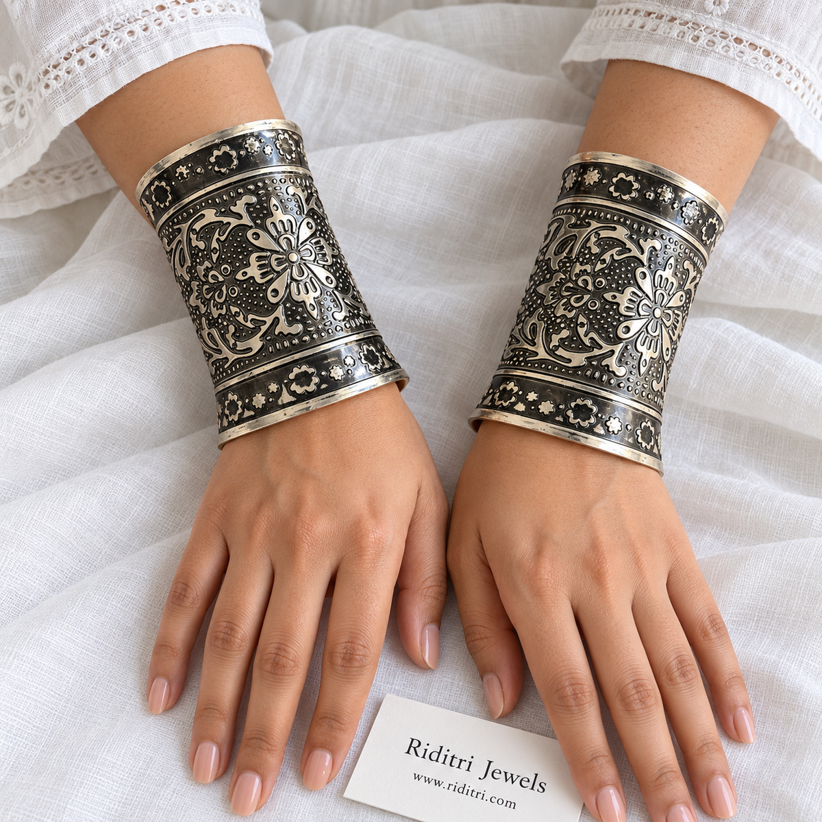 Gul Bahar adjustable broad cuff bracelets pair with big blooming flower motif on a dotted background in oxidised finish by Riditri