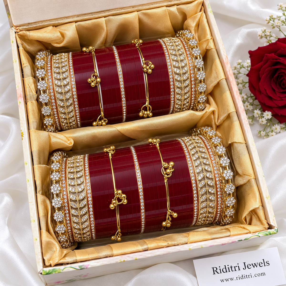 Maroon bridal chooda set for both hands with AD stone kadas, maroon chooda bangles and gold-toned ghungroo bangles by Riditri