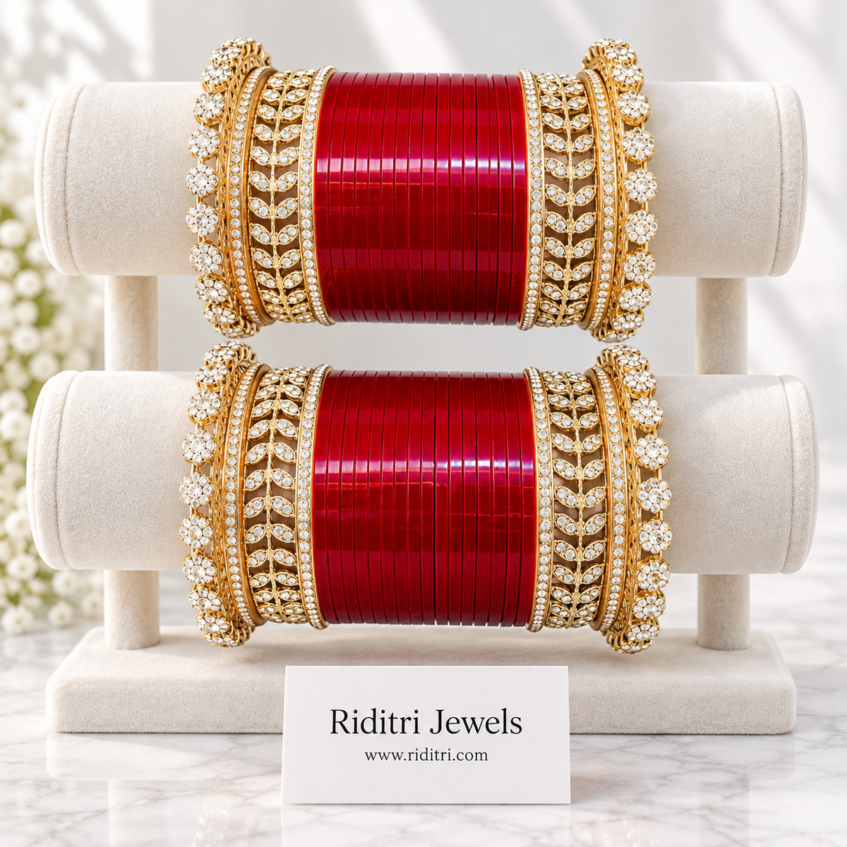 Red Bridal Chooda Set – matched pair on ivory satin with rose petals, sparkling AD stone leaf-pattern kadas, view 3