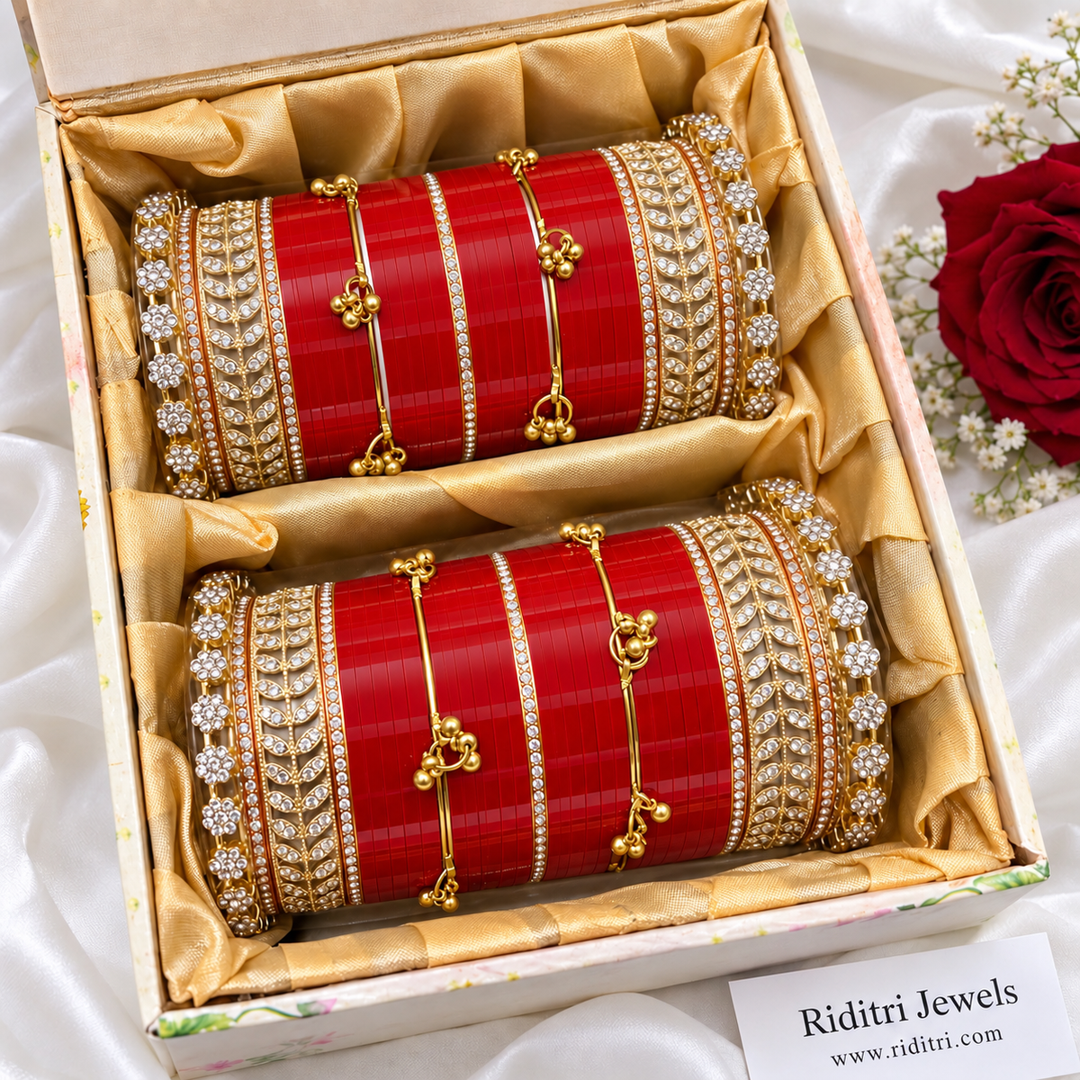 Red bridal chooda set for both hands with AD stone kadas, red chooda bangles and gold-toned ghungroo bangles by Riditri
