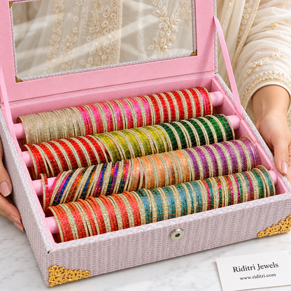 Open pink bangle box filled with 12 colours of raindrop glass bangles and stone bangles