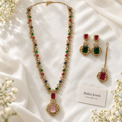 Multicolour stone pendant with blush pink centre stone on antique gold-toned long necklace