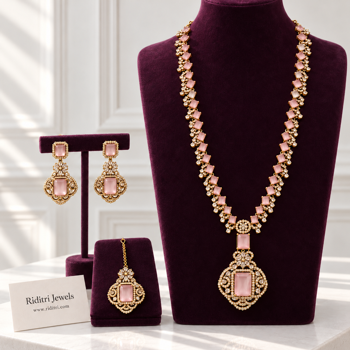 Nita Ambani inspired baby pink necklace set with long necklace, drop earrings and maang tika