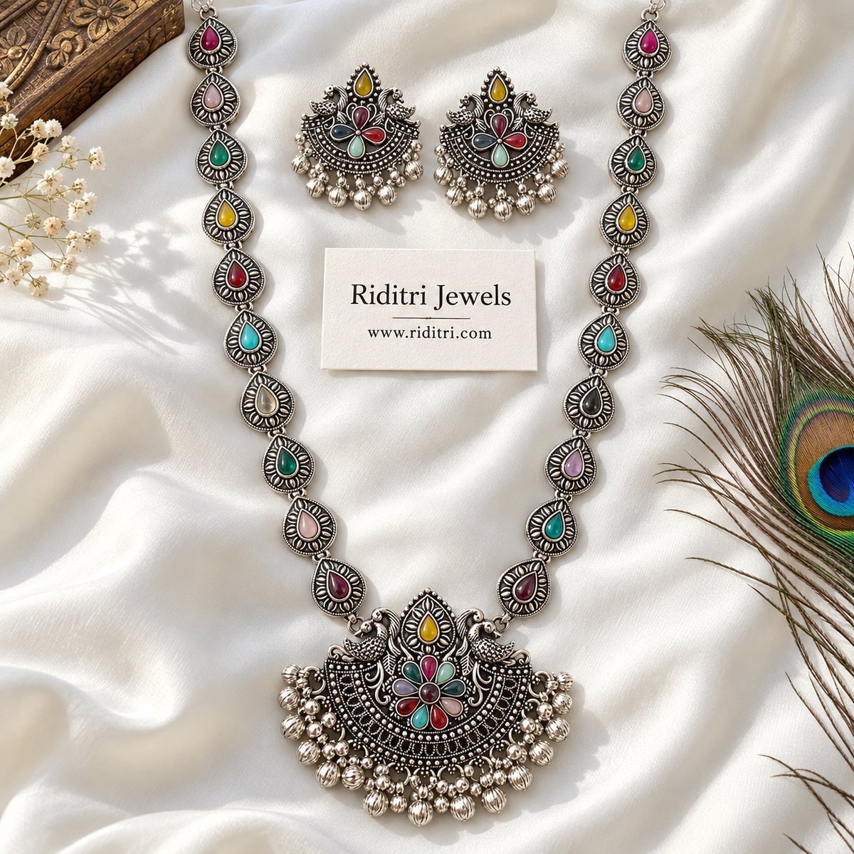 Oxidised twin peacock pendant with multicolour stone flower and ghungroo fringe