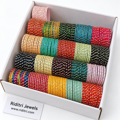 21 colours of stone-studded glass bangles from pastel to deep shades by Riditri