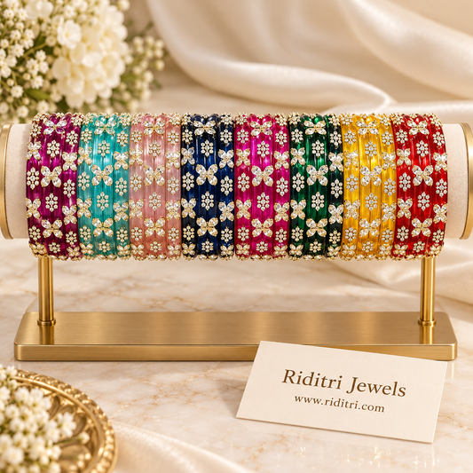 8 colour stone glass bangles combo with sparkling kundan-style bow and flower stones