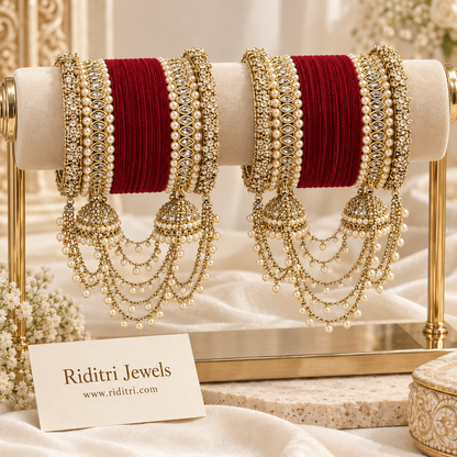 Pair of maroon velvet reverse AD bridal bangle stacks with pearl chain latkans