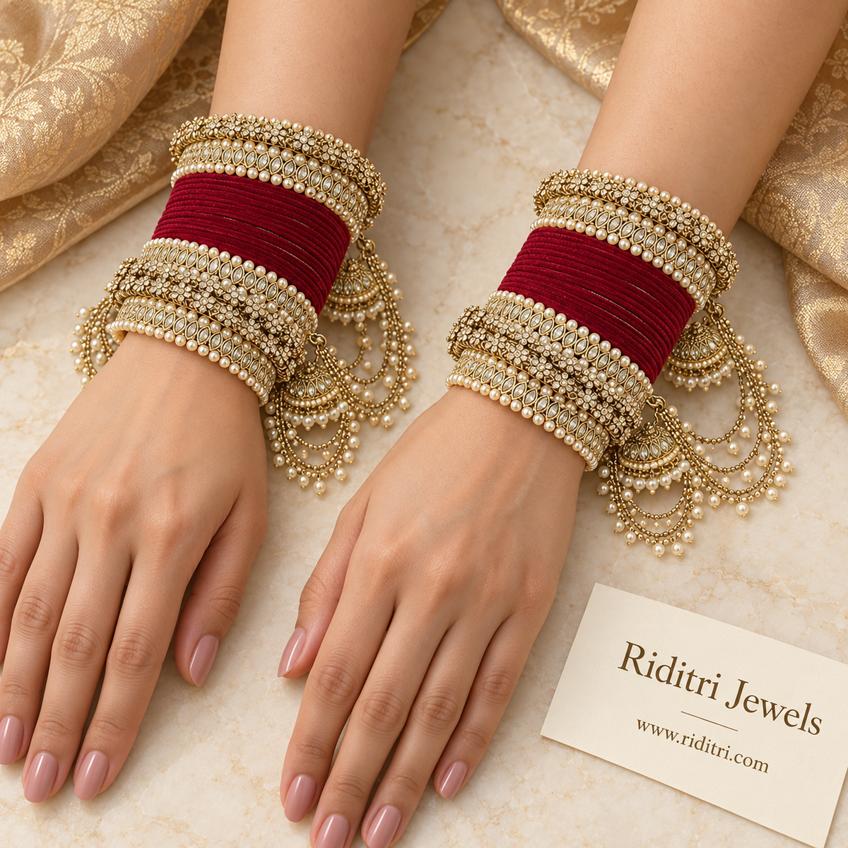 Maroon velvet bridal bangle set with reverse AD stone kadas, pearl borders and jhumka latkans