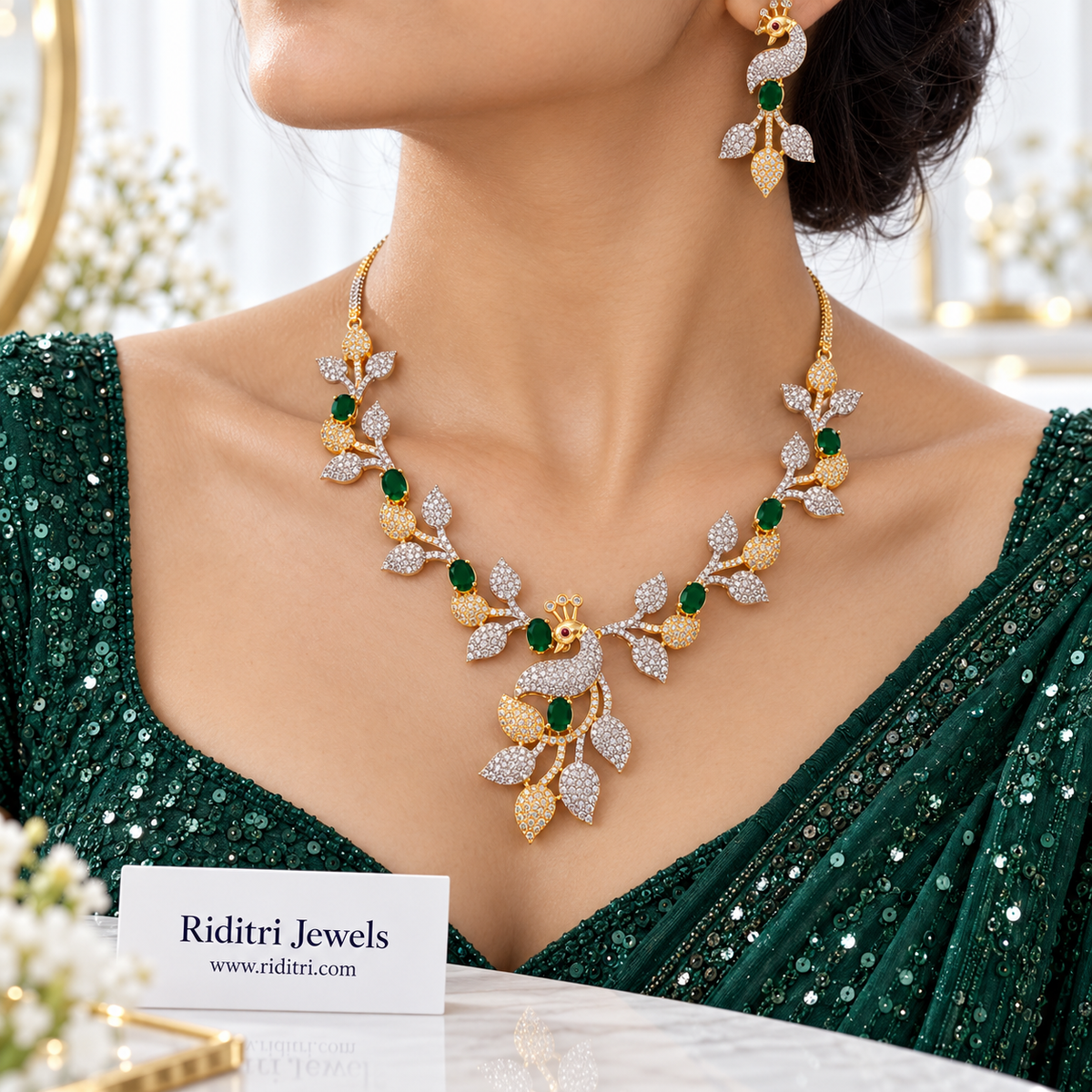 Emerald green AD peacock earrings with silver and gold leaf drops